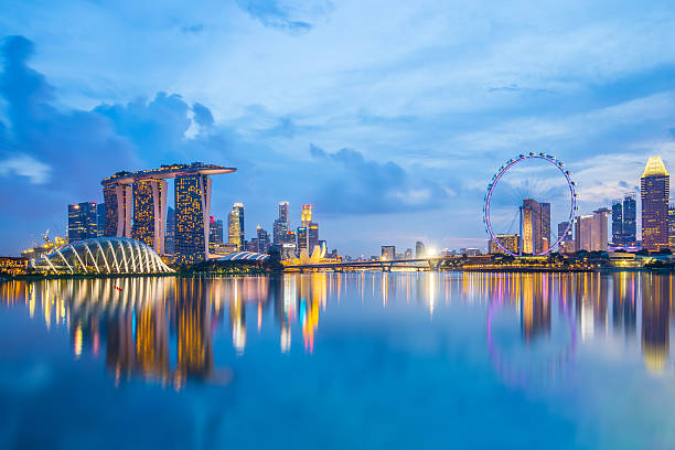 Singapore Skyline and view of Marina Bay at twilight.